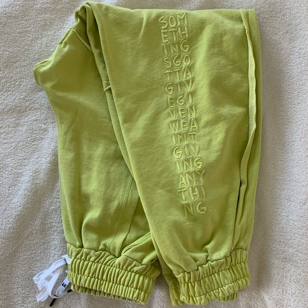 Liam Hodges like/neon green sweatpants